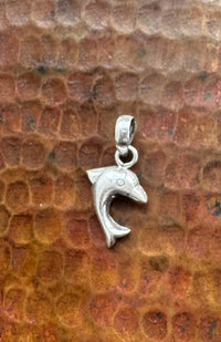 Tiny sterling silver dolphin pendant charm fair trade Nepal