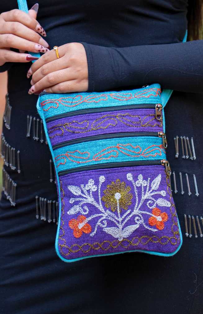 embroidered purse with four outside zipper pockets fair trade Nepal