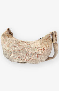 natural color hemp crescent moon bag with rust colored embroidery