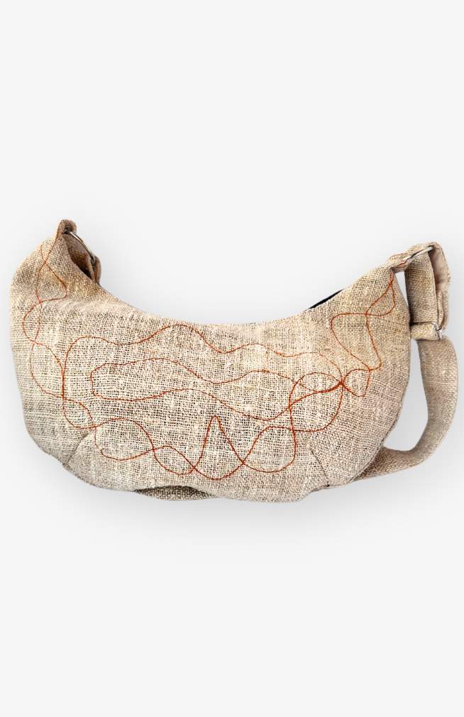 natural color hemp crescent moon bag with rust colored embroidery