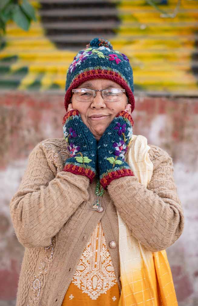wool knit fingerless gloves with embroidered flowers, fleece lined. Fair trade Nepal