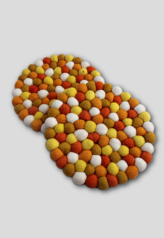 felt ball trivet orange fair trade nepal