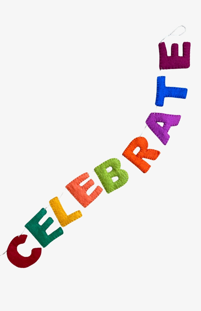 A colorful 'CELEBRATE' felt letter garland. Fair Trade and handmade in Nepal.
