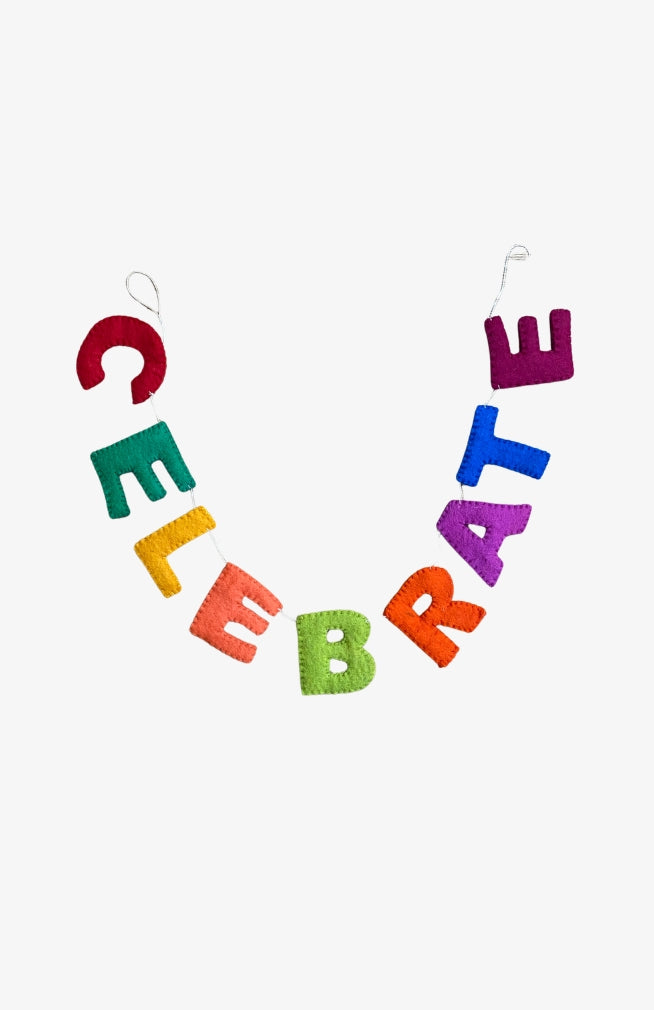 A colorful 'CELEBRATE' felt letter garland. Fair Trade and handmade in Nepal.