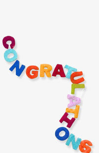A colorful felt letter garland spelling 'CONGRATULATIONS'. Handmade in Nepal.