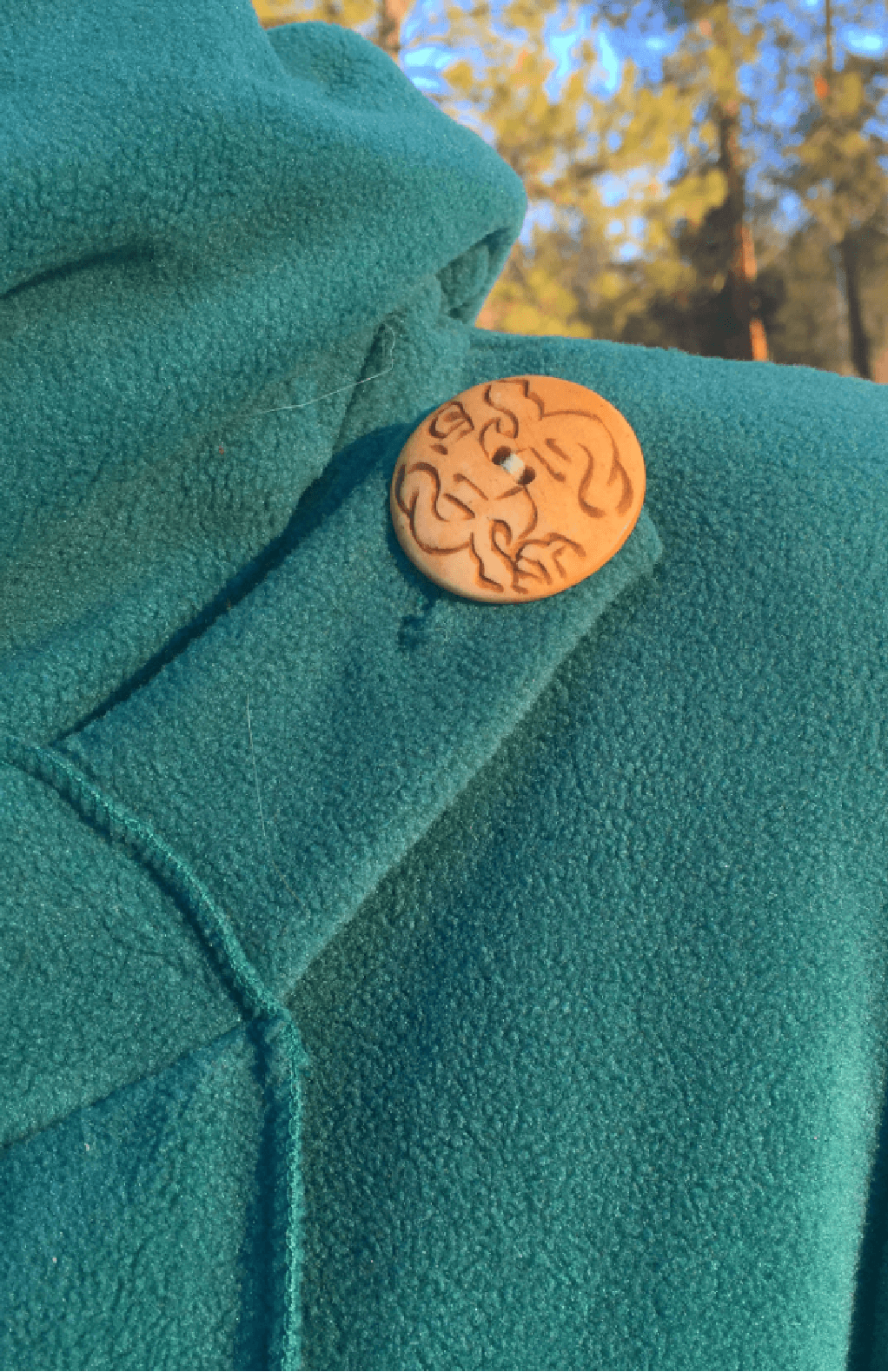 Handcrafted fleece wrap around jacket with pockets and hood. Fair trade Nepal.