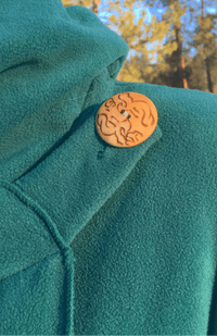 Handcrafted fleece wrap around jacket with pockets and hood. Fair trade Nepal.