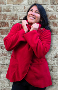 Handcrafted fleece wrap around jacket with pockets and hood. Fair trade Nepal.