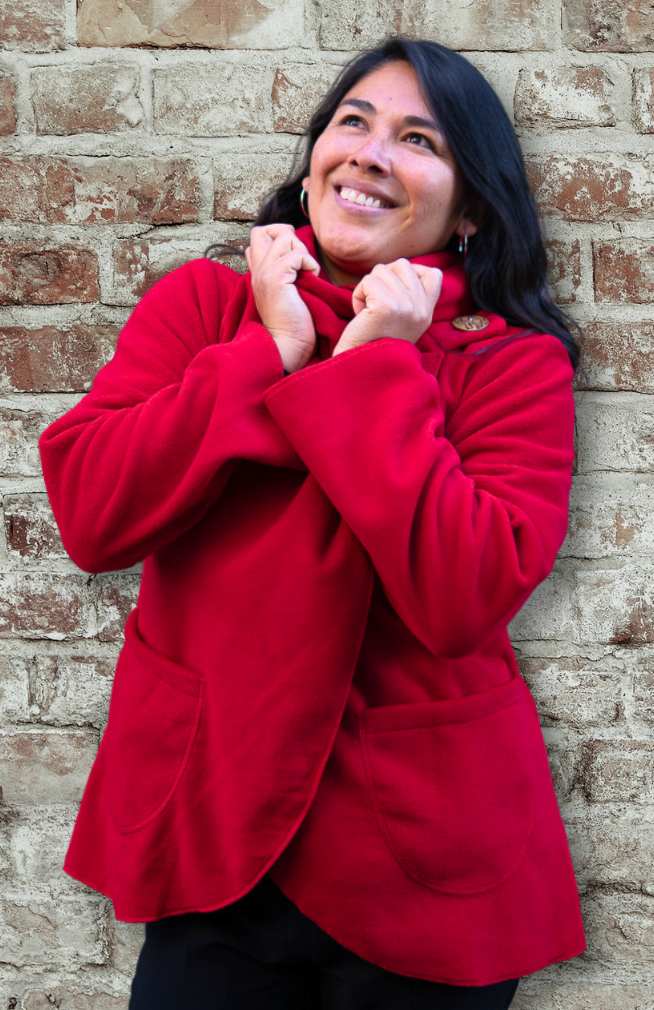 Handcrafted fleece wrap around jacket with pockets and hood. Fair trade Nepal.