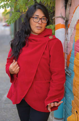 Handcrafted fleece wrap around jacket with pockets and hood. Fair trade Nepal.