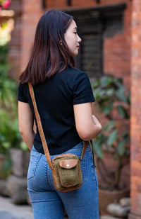 hemp and no kill leather purse with adjustable strap and snap pocket