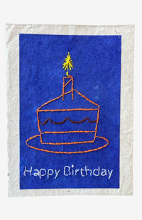 Hand embroidered happy birthday card with piece of cake and candle