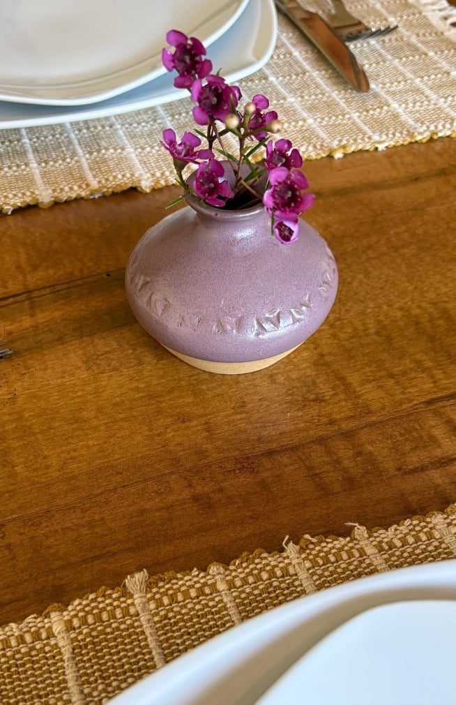 Small handmade ceramic bud vase, handmade in Nepal with a triangle design, available in an assortment of colors.