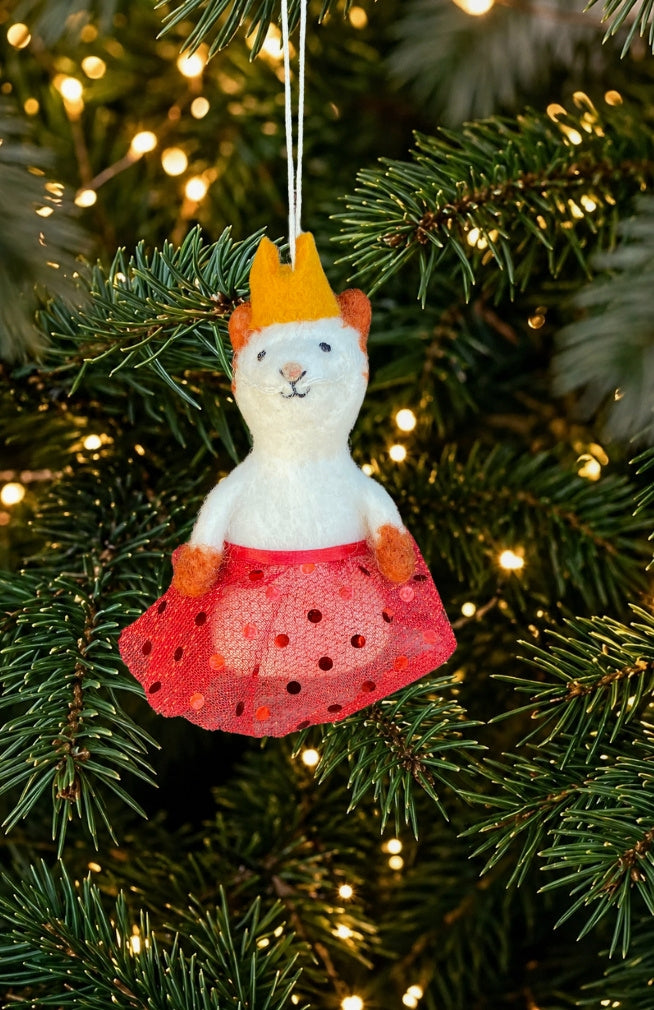 A dancing cat ornament and finger puppet with sparkly skirt and crown. Fair trade and handmade in Nepal.