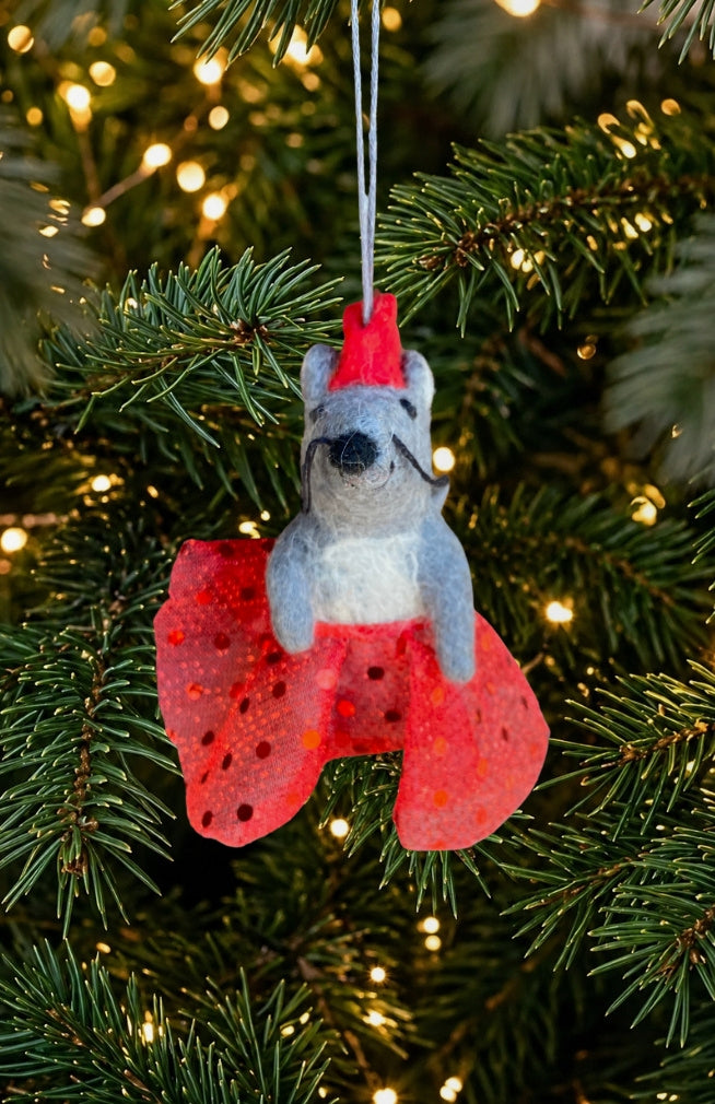 A dancing mouse ornament and finger puppet with sparkly skirt and crown. Fair trade and handmade in Nepal.