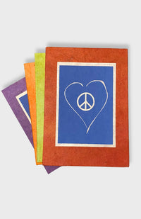 Handcrafted Lokta Paper Large Journal with love and peace design. These journals are handmade by artisans in Nepal and come in assorted vibrant colors.