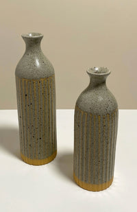Small and large stoneware ceramic bud vase with stripes, handcrafted by artisans in Nepal.