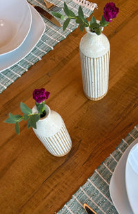 Small and large stoneware ceramic bud vase with stripes, handcrafted by artisans in Nepal.