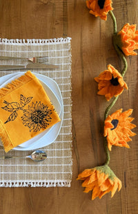 Handmade Cotton Sunflower Napkin and Handmade Felt Sunflower Garland with 10 sunflowers and green stem. Handmade in Nepal.