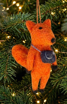 A handful felted "tourist" orange fox ornament with camera, handmade in Nepal of 100% New Zealand wool.