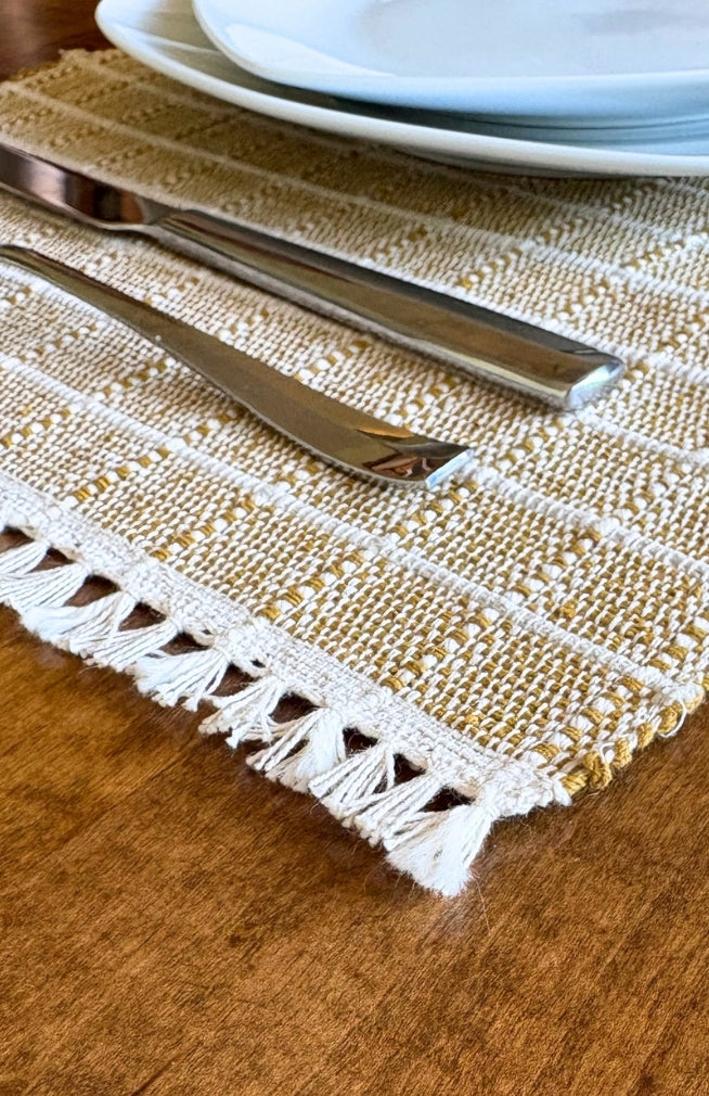 Handwoven ribbed cotton placemat with subtle square design available in assorted colors. Handmade in Nepal.