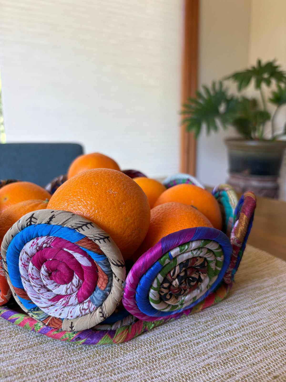 recycled silk sari coiled basket bowl handcrafted by artisans in Nepal. Unique, beautiful bowl, Fair Trade.