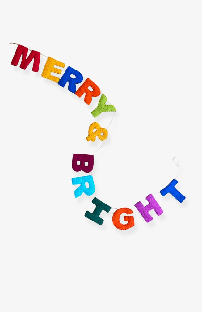 A festive 'MERRY & BRIGHT' letter banner made of colorful felt letters 