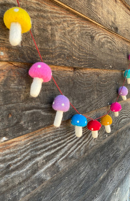 Handmade colorful felt mushroom garland. Fair trade Nepal.