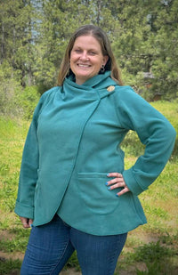 Handcrafted fleece wrap around jacket with pockets and hood. Fair trade Nepal.