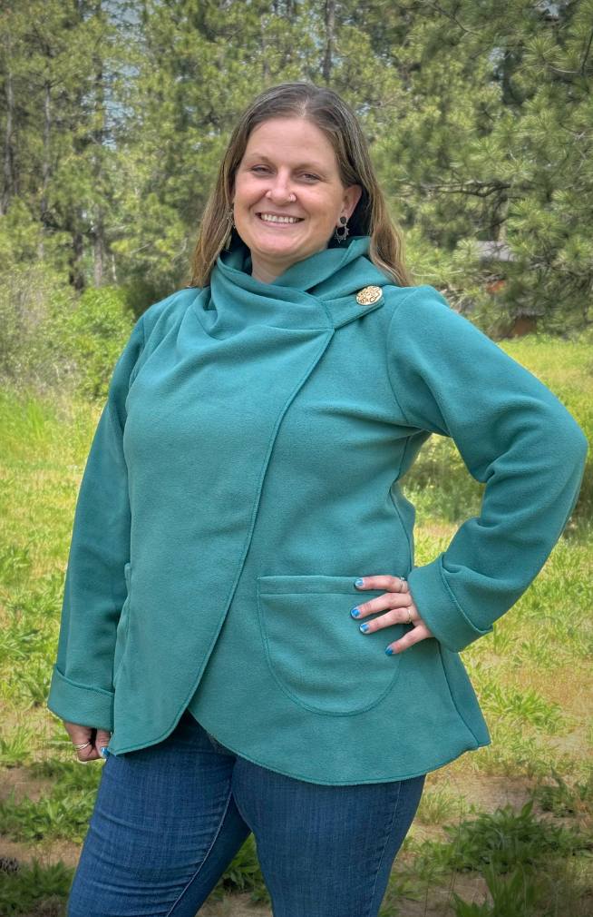 Handcrafted fleece wrap around jacket with pockets and hood. Fair trade Nepal.