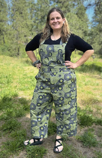 green cotton overalls with circular screen printed design