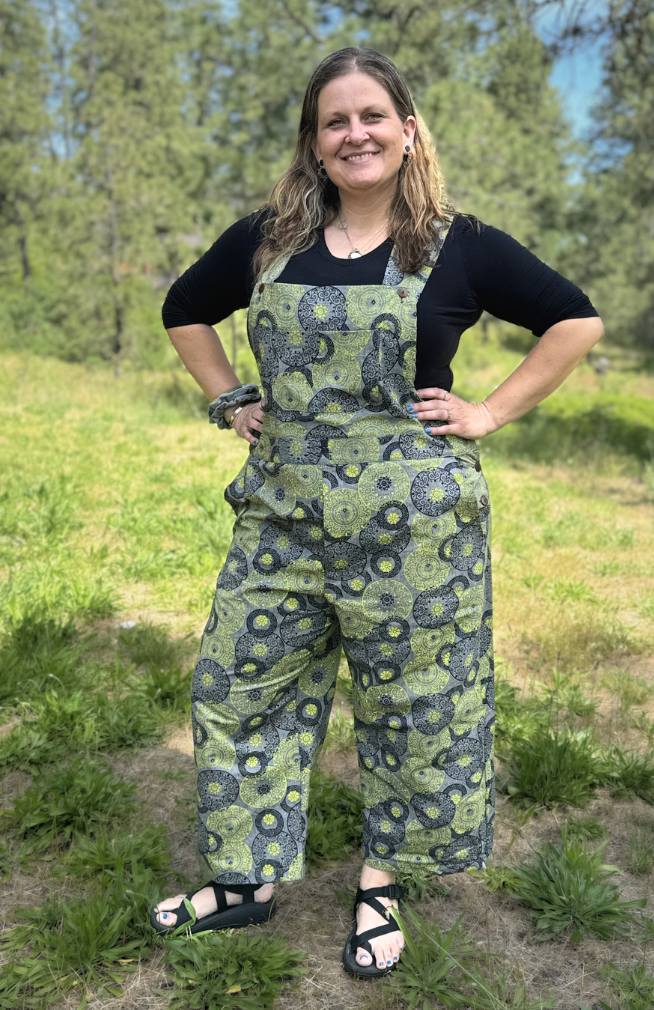 green cotton overalls with circular screen printed design