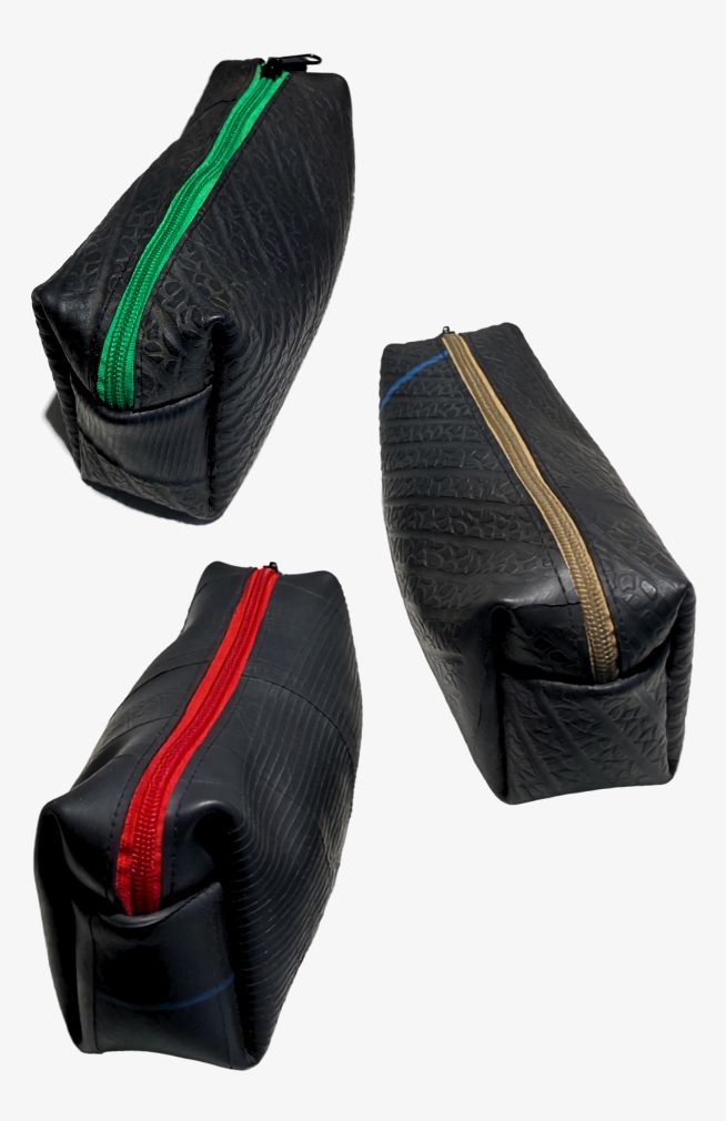 Toiletry Bag Handmade from recycled rubber with striped cotton lining and interior pocket. Handmade by artisans in Nepal