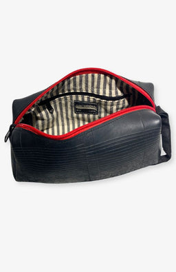 Toiletry Bag Handmade from recycled rubber with striped cotton lining and interior pocket. Handmade by artisans in Nepal