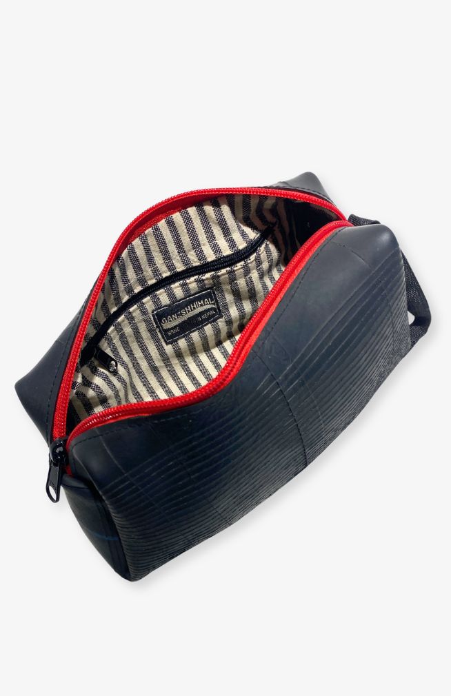 Toiletry Bag Handmade from recycled rubber with striped cotton lining and interior pocket. Handmade by artisans in Nepal