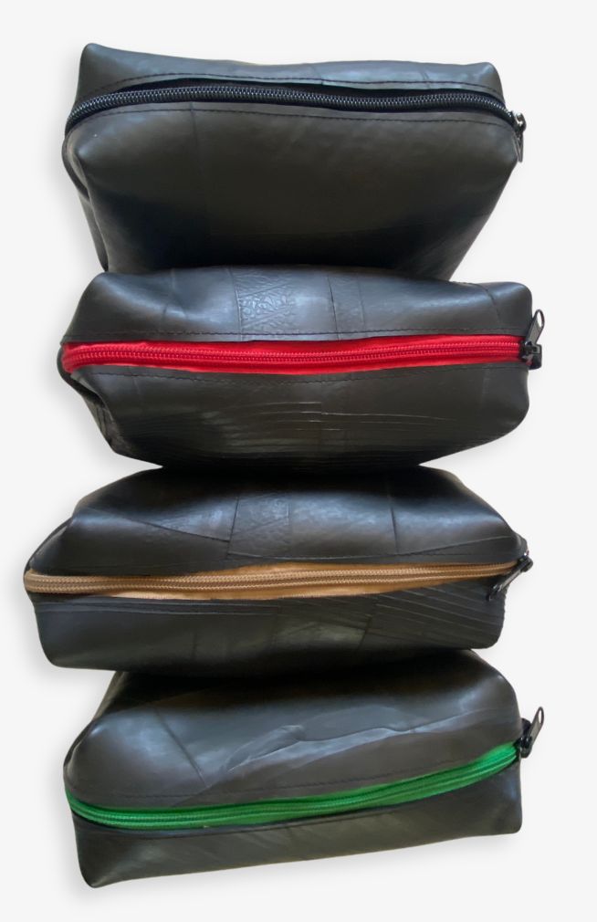 Toiletry Bag Handmade from recycled rubber with striped cotton lining and interior pocket. Handmade by artisans in Nepal