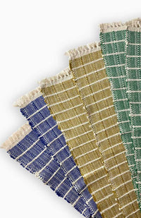 Handwoven ribbed cotton placemat with subtle square design available in assorted colors. Handmade in Nepal.