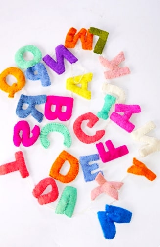 Colorful felt alphabet garland, handmade in Nepal.