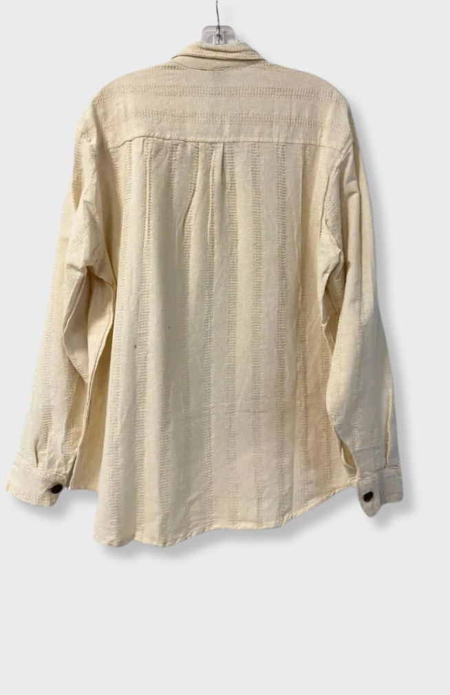 A fair trade, cream-colored textured long-sleeve button-up shirt with a collar and chest pocket