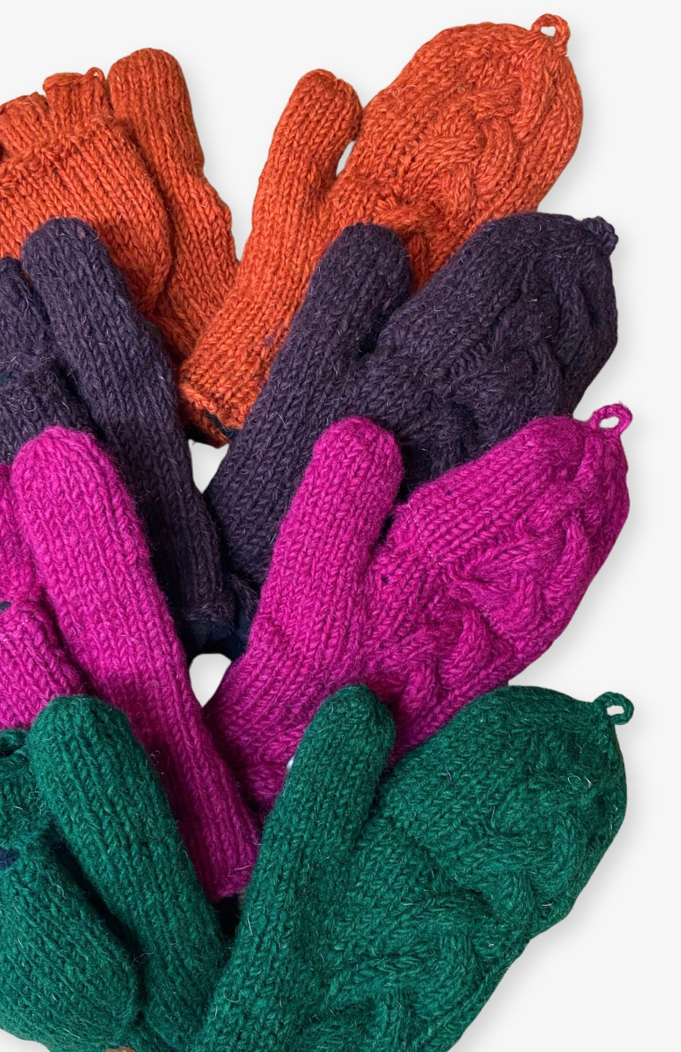 Fair trade handmade fleece lined wool glitten made by artisans in Nepal