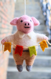 hand felted pig with flag banner ornament