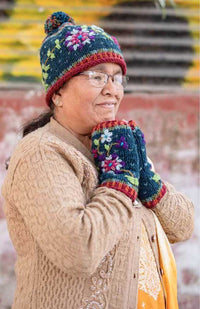 Hand made winter hat with flower embroidery design and pom pom, certified fair trade