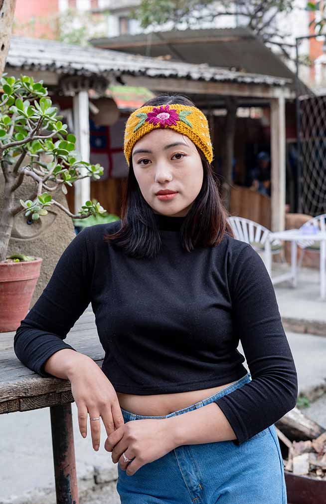 wool knit headband with flower embroidery from nepal jewel tones gorgeous feminine bow shape