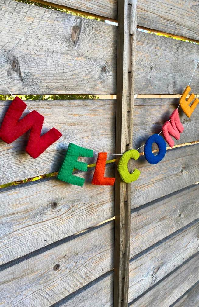 Colorful Felt "Welcome" Garland, handmade in Nepal.