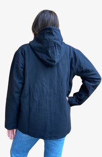 back view of heavy cotton jacket, solid black with hood, fair trade Nepal