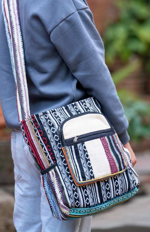 cotton bucket bag with rounded, zippered front pocket