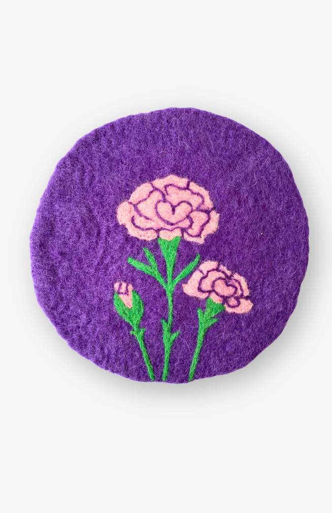 Pink carnation felt trivet, flower of the month January, on purple background