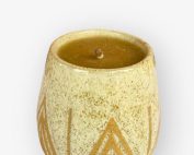 pure Nepali beeswax candle with cotton wick in ceramic cup with mountain design