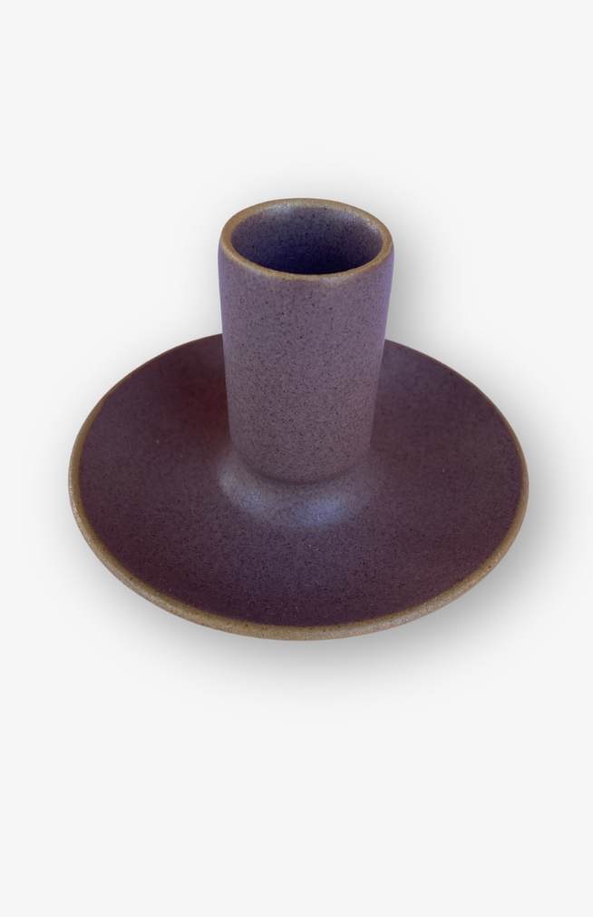 plum colored taper candle holder with circular base