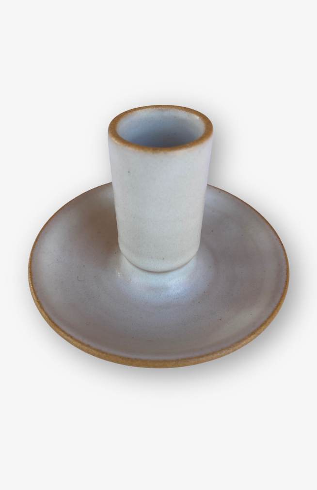 white ceramic taper candle holder